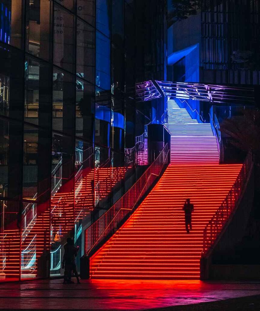 The beautiful Grand Steps at the Plaza Entrance features interactive LED lighting and music that changes with the seasons and events, connects to all levels of LaLaport BBCC, and is a popular hangout spot.