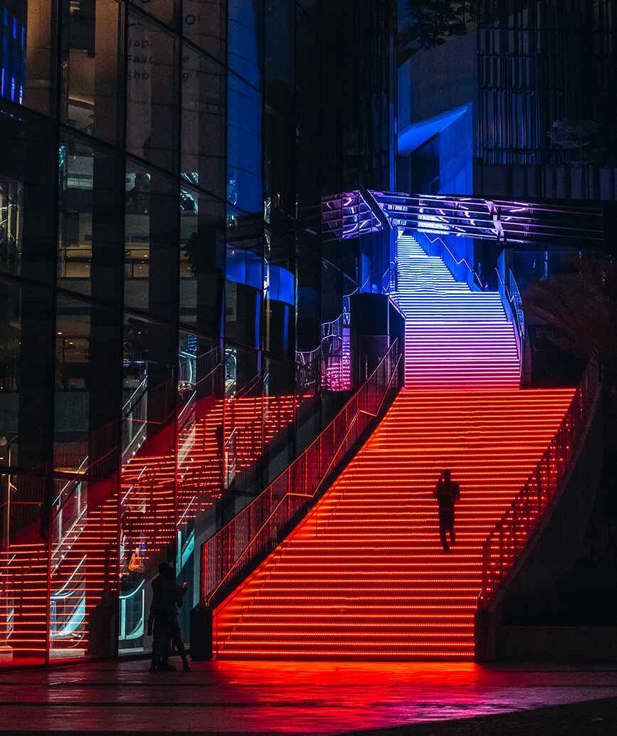 The beautiful Grand Steps at the Plaza Entrance features interactive LED lighting and music that changes with the seasons and events, connects to all levels of LaLaport BBCC, and is a popular hangout spot.