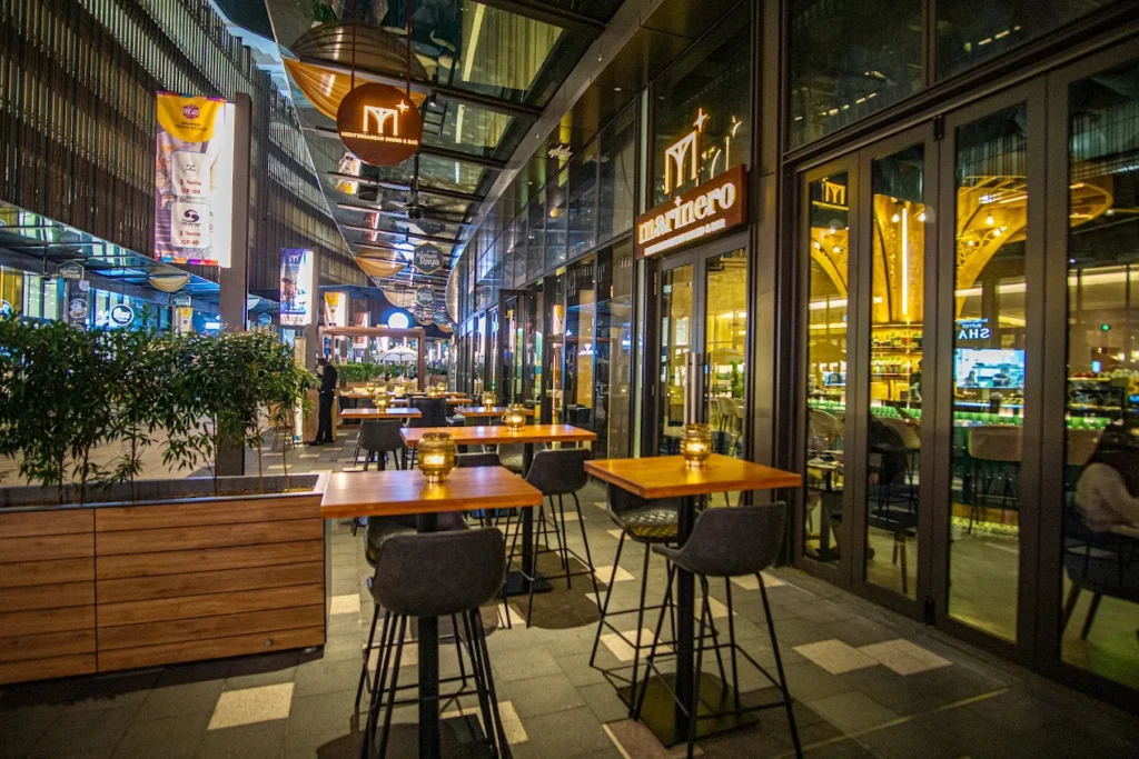 Designed in rustic Moorish style with warm lighting, Marinero Mediterranean Dining & Bar features authentic Greek, Moroccan, Italian, and Spanish dishes.