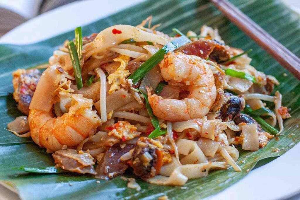 Char Kuey Teow with cockles, prawns, and smoky wok hei aroma from KL Hokkien Mee at Food Place Pavilion KL