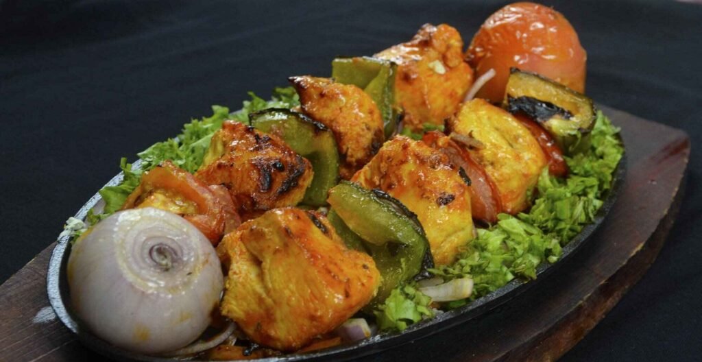 Grilled Chicken Shish Tawook skewers, featuring marinated chicken cubes with a golden-brown char, available at BBQ Nights, Food Republic Pavilion KL
