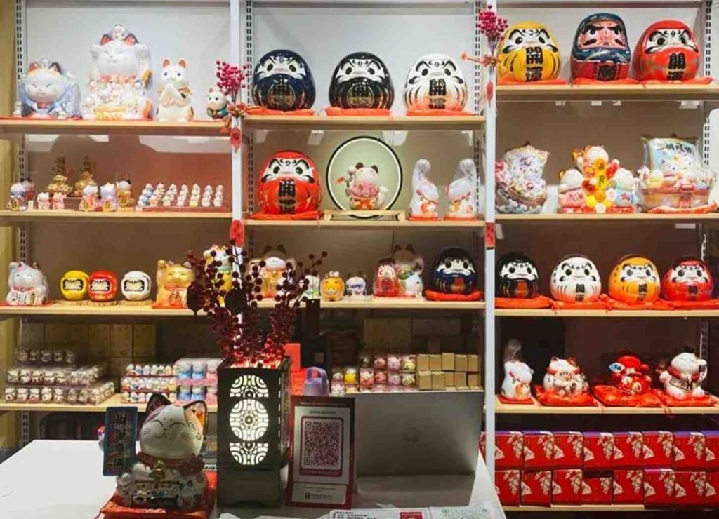 Beckoning Cat & Daruma statues on display at Koun Na Neko, Tokyo Street Pavilion Kuala Lumpur