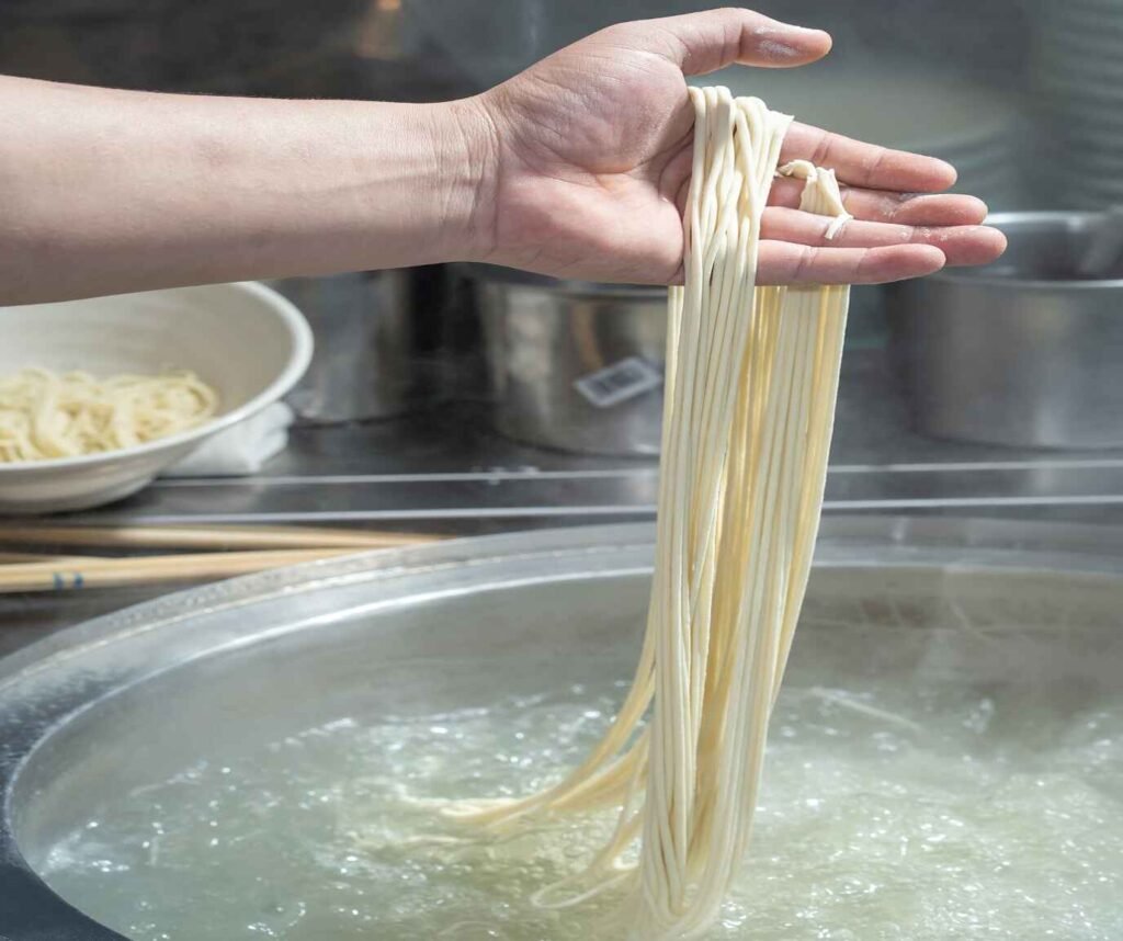 Hand-pulled noodles, made in traditional techniques, being prepared at Mee Tarik, Food Republic Pavilion KL