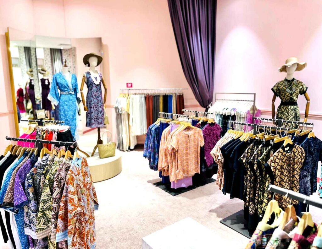 Batik Fair featuring shirts, dresses, skirts, tops and hats with Batik designs on display on the rack and on mannequins at Parkson Elite, Pavilion Kuala Lumpur