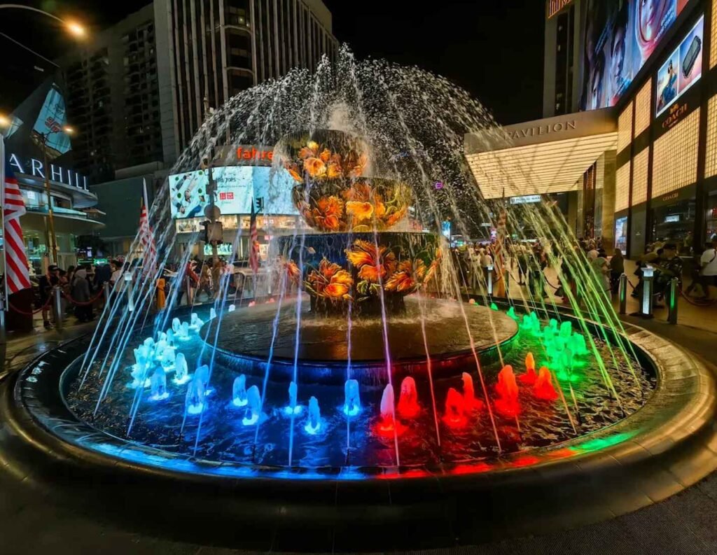 Crystal Fountain at Pavilion Kuala Lumpur displaying colourful neon lights.