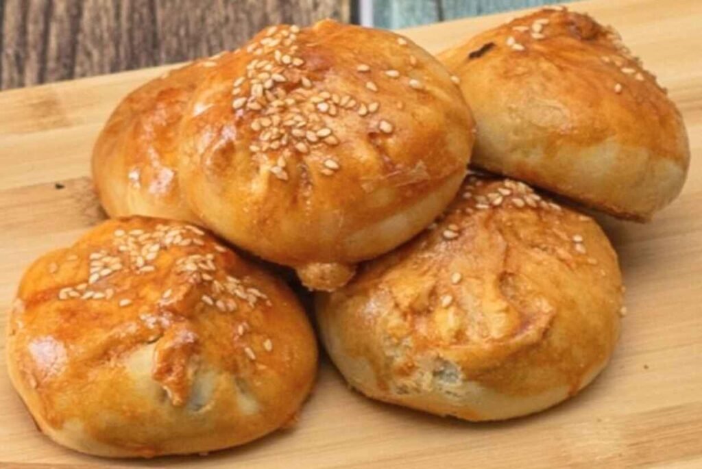 Pork Siew Bao is a flaky, crispy, and often golden-brown baked pastry crust filled with savory-sweet char siu pork mixture. The contrast between the tender pork and the delicate, buttery, layered pastry is what makes it distinct. Available at Siew Bao & Herbal Tea, Food Place, Pavilion KL.