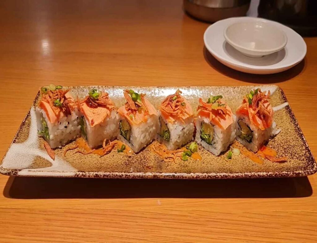 Fire Cracker Roll: Salmon, cream cheese & cucumber sushi topped with spicy mayonnaise & bonito flakes, a signature dish at Sushi Zanmai, Tokyo Street Pavilion Kuala Lumpur