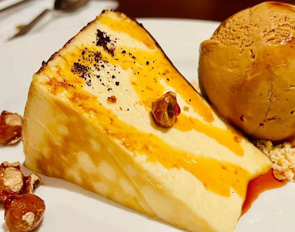 The Signature 6th Avenue Bask Cheesecake, a top rated burnt Basque-Japanese cheesecake known for its rich, creamy texture and melt-in-your-mouth quality, served with silky smooth whipped cream at The Tokyo Restaurant, The Table @ Isetan The Japan Store, Lot 10, Bukit Bintang, Kuala Lumpur.