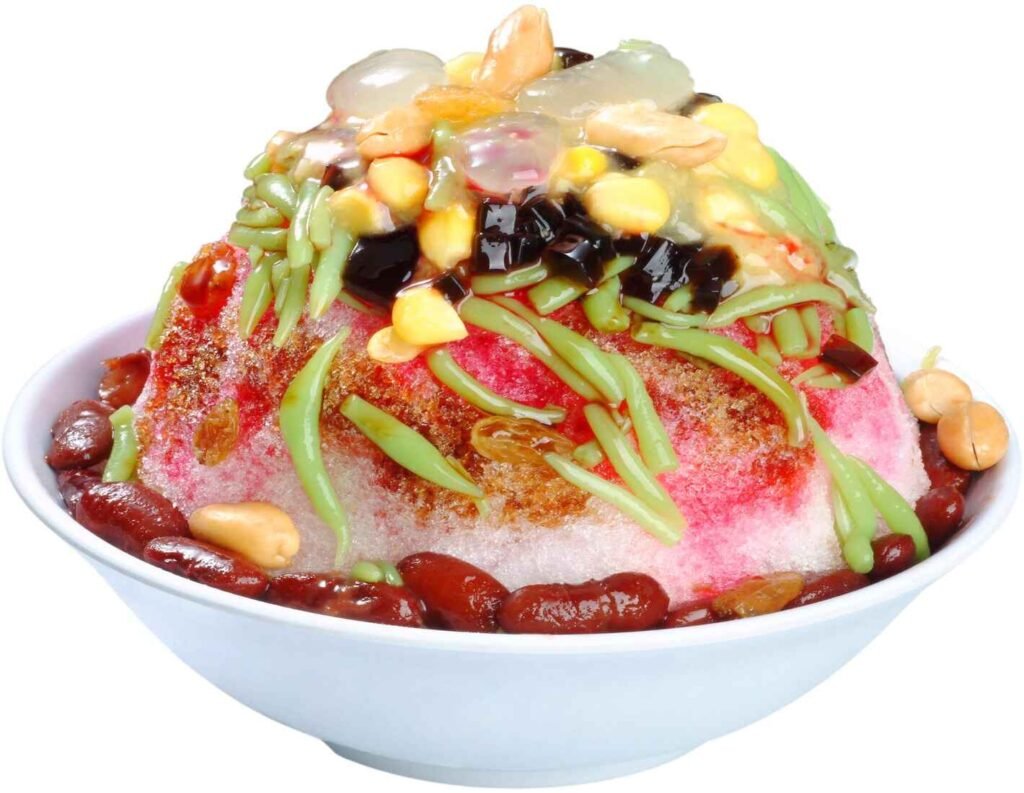 A vibrant bowl of Ais Kacang (also known as ABC, air batu campur & ice kacang) from Oriental Dessert at Lot 10 Hutong, topped with red beans, sweet corn, grass jelly, and drizzled with syrup and evaporated milk.
