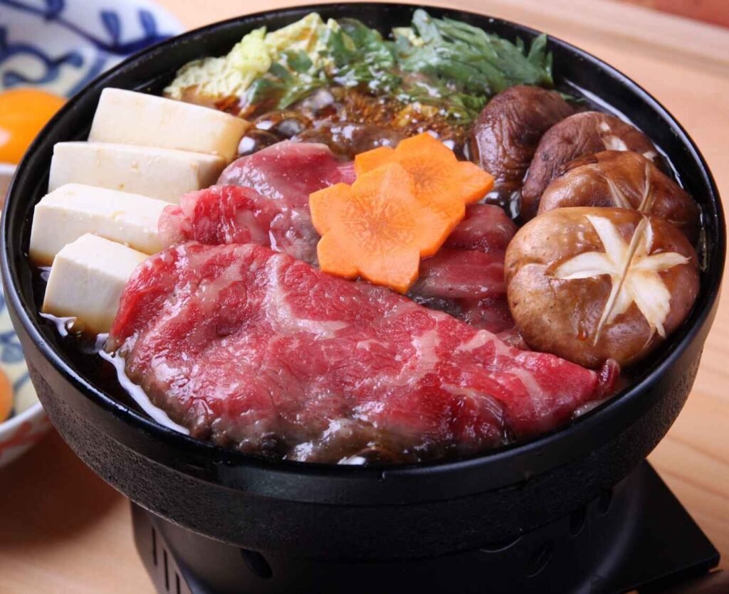 A luxurious nabe (hotpot) of bubbling Japanese A5 Wagyu Sukiyaki with marbled Wagyu sirloin, mushrooms, tofu, eggs and vegetables. A top rated dish at Touan Japanese Restaurant, The Table @ Isetan The Japan Store, Lot 10, Bukit Bintang, Kuala Lumpur.