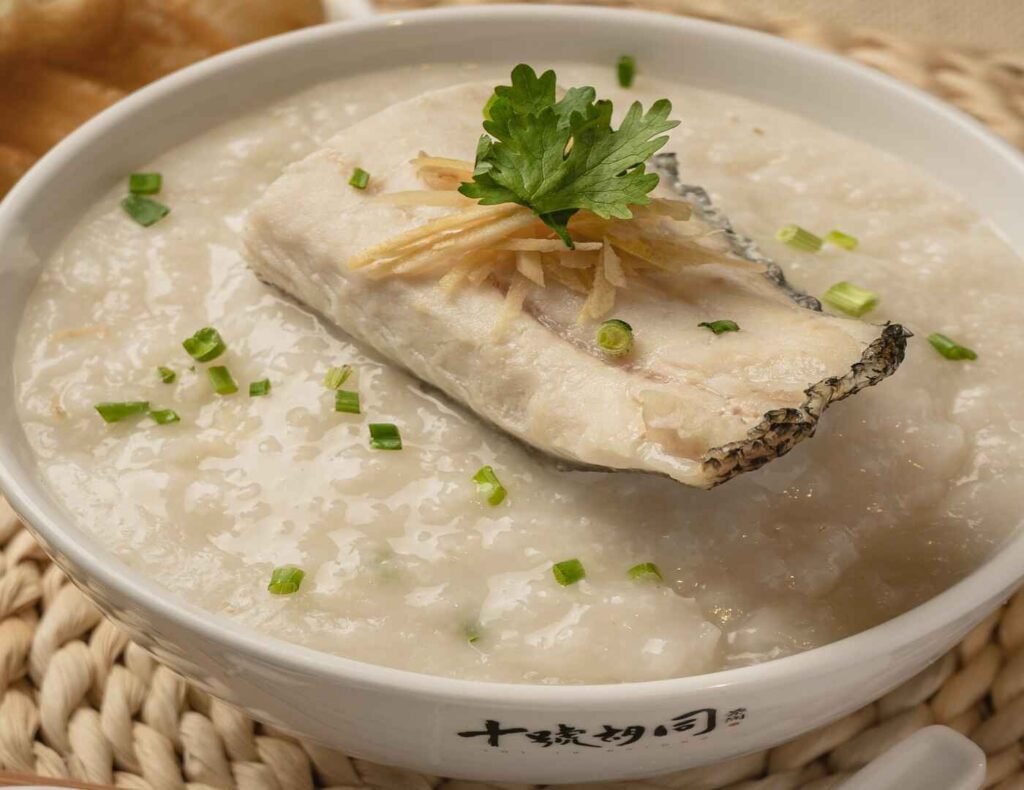 Sang Yu congee, also known as Raw Fish Porridge or Haruan Fish Porridge, is a signature dish at Hon Kee Porridge in Lot 10 Hutong. The key feature is the use of fresh, thinly sliced haruan (snakehead) fish, which is added to the hot congee and cooked by its heat.
