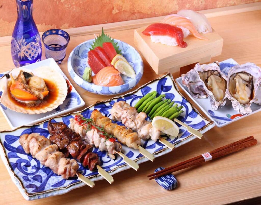 From the top left, Grilled Scallop With Butter Soy Sauce, Tuna Akami & Salmon Sashimi, Tuna Akami Sushi, Salmon Sushi, Kanpachi Sushi, Assorted Yakitori (5 Types), and Grilled Oysters. Top rated dishes at Touan Japanese Restaurant, The Table @ Isetan The Japan Store, Lot 10, Bukit Bintang, Kuala Lumpur.