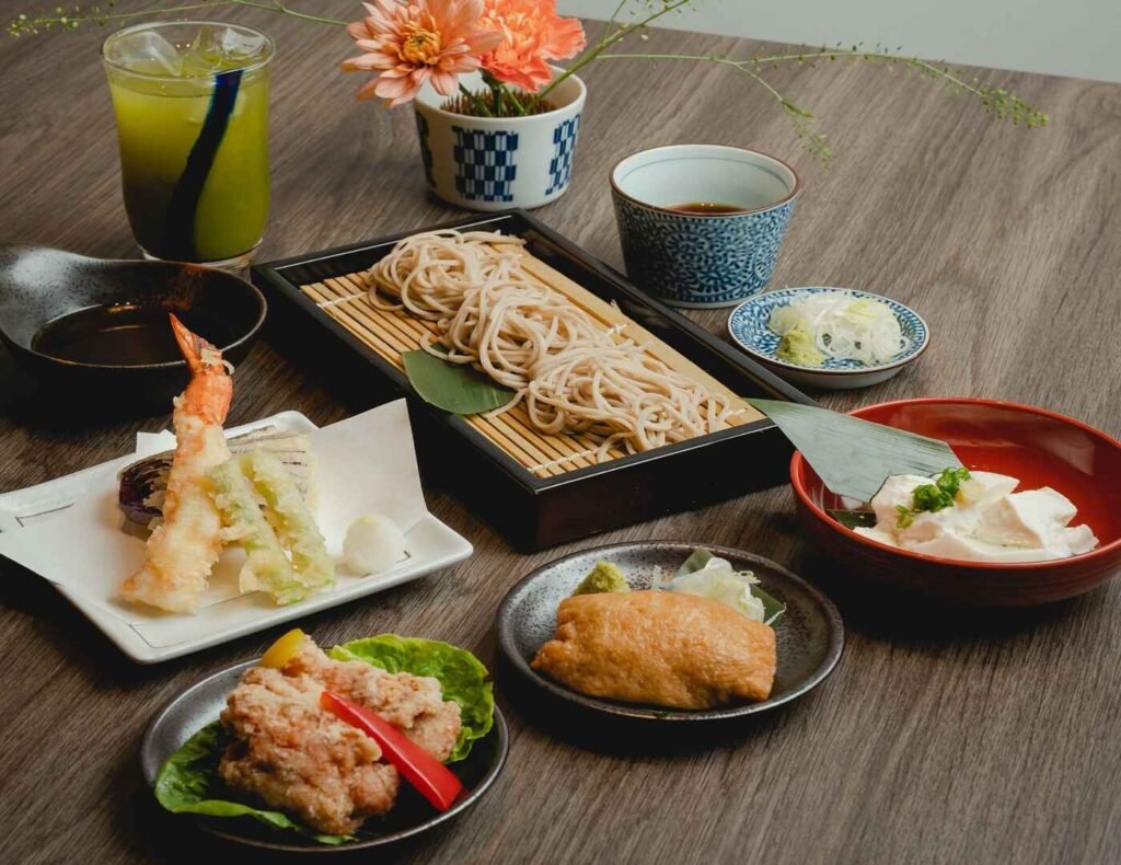 Homemade Cold Soba with Assorted Tempura (shrimp, okra and eggplant), Koumi Chicken Karaage, Homemade Fresh & Cold Tofu, Soba Inari (deep fried tofu pockets stuffed with buckwheat noodles seasoned in a sweet & salty dashi based broth) with wasabi, ginger & scallions, along with Green Tea High (also known as Ryokucha Hai or Ryokucha Wari, a popular Japanese cocktail made with shochu, green tea & ice) all top rated choices at Mitsumori KL, The Table @ Isetan The Japan Store, Lot 10, Bukit Bintang, Kuala Lumpur.