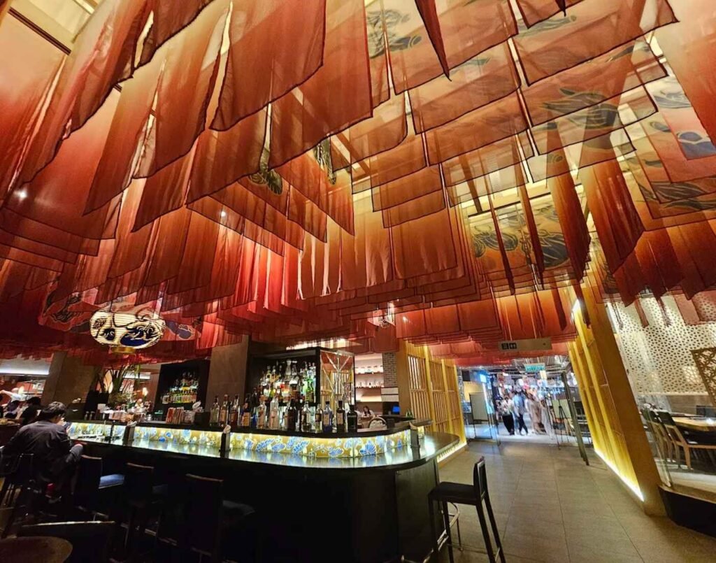 The Tokyo Restaurant, adorned with elegant Japanese decor and warm lighting at The Table @ Isetan The Japan Store, Lot 10, Bukit Bintang, Kuala Lumpur.