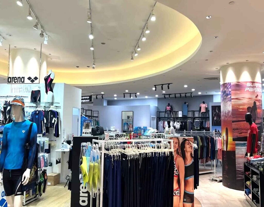 Arena and Surfers Paradise feature highlights modern beachwear, watersports accessories and stylish swimsuits in a side-by-side contemporary retail display setup at The Wellness, Second Floor, Isetan The Japan Store Lot 10, Bukit Bintang, Kuala Lumpur.