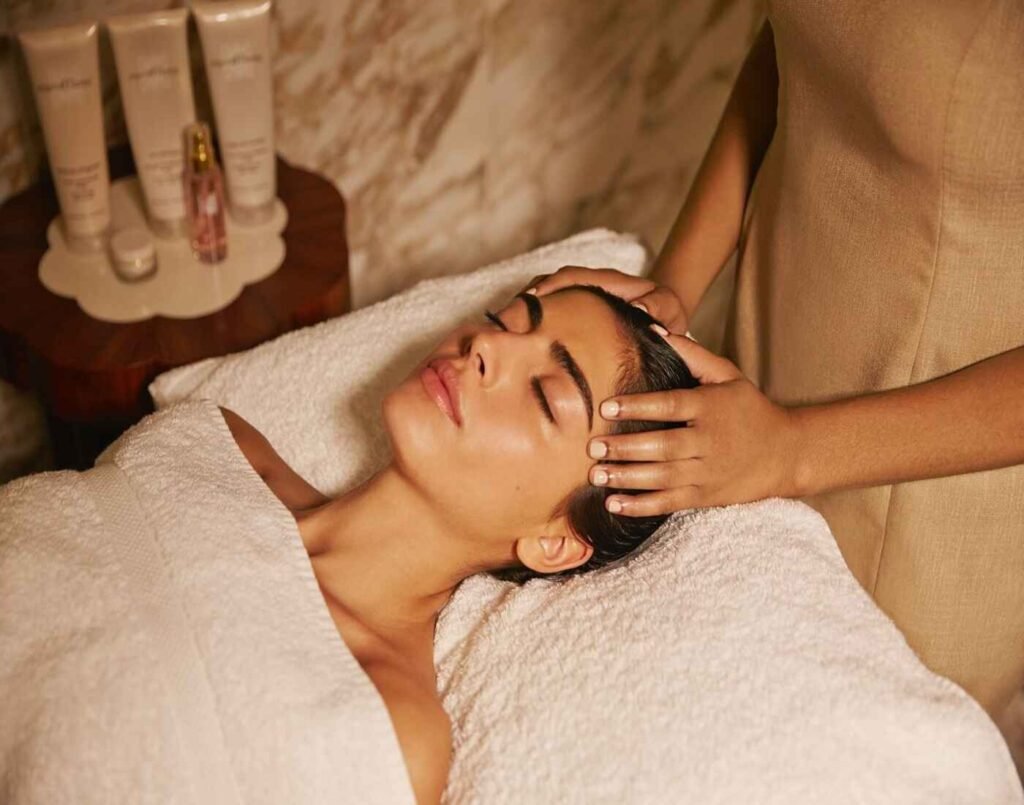 A woman enjoying the Maroc Maroc Revitalising Facial package, a traditional Moroccan beauty ritual featuring luxurious argan oil, soothing honey extracts, rhassoul, rose water, and refreshing Neroli extracts, to rejuvenate and revitalize skin to radiant health. Available at Hammam Spa, The Wellness, Second Floor, Isetan The Japan Store Lot 10, Bukit Bintang, Kuala Lumpur.