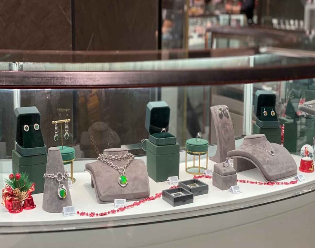 Elegant handcrafted earrings, bracelets, necklaces, cufflinks & rings adorned with precious gems such as Meteorite and Ammolite on display at Kaimirra Tutan, a jewelry store at The Design, Ground Floor, Isetan The Japan Store Lot 10, Bukit Bintang, Kuala Lumpur.