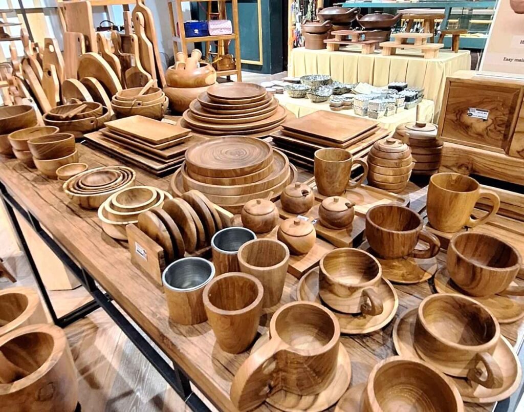 Extensive display of beautiful, high-quality, handcrafted teak wooden tableware and kitchenware collection, including plates, bowls, serving boards, and mugs, at the Home Select section of The Design, Isetan The Japan Store Lot 10 in Bukit Bintang, Kuala Lumpur.