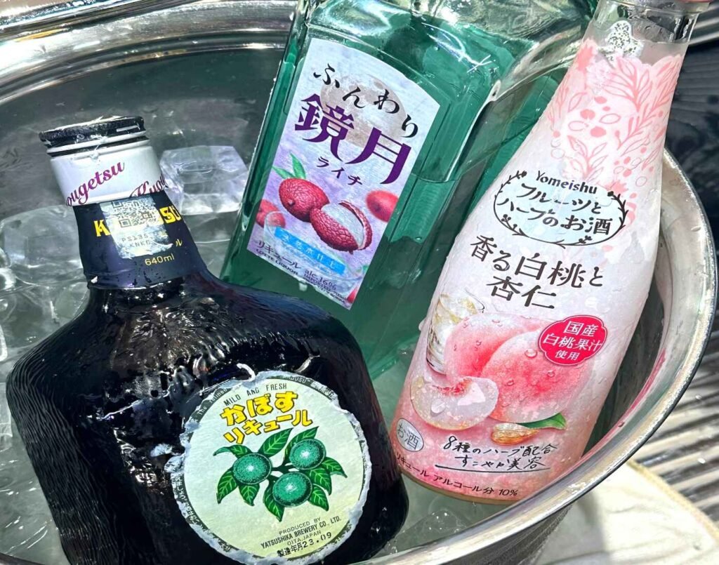 Funwari Kyogetsu Lychee Liqueur (Shochu) by Suntory, Kabosu Liqueur by Yatsushika Brewery, and Fruits and Herb Liqueur, Scented White Peach & Apricot Kernel by Yomeishu, available at the Alcohol Corner of Jonetz By Don Don Donki Lot 10.