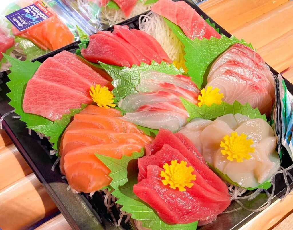 Honmaguro Tappuri Moriawase sashimi platter featuring O-toro, Chutoro, Akami, scallops, yellowtail, madai, Atlantic salmon, and kanpachi. Available in the Uohama seafood section at Jonetz By Don Don Donki Lot 10, a Japanese supermarket in Bukit Bintang, Kuala Lumpur.