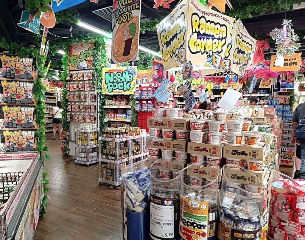 A wide selection of Japanese instant ramen, cup noodles, yakisoba, udon and soba displayed in aisles at Don Don Donki Lot 10 in Bukit Bintang Kuala Lumpur.