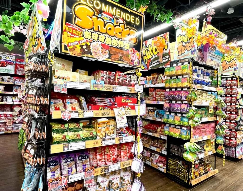 Aisles filled with Japanese snacks, confectionery, chocolates, biscuits, chips, crackers and candy in various sizes and packs at Jonetz By Don Don Donki Lot 10, a Japanese supermarket in Bukit Bintang, Kuala Lumpur.