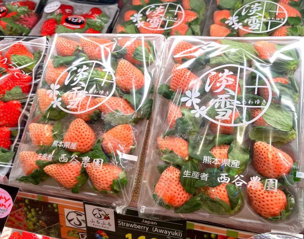 Premium Japanese strawberries from Kumamoto prefecture including Awayuki, Kaorino, and Yubeni varieties, displayed in the Furu Furu premium fruits section at Jonetz By Don Don Donki Lot 10, a Japanese supermarket in Bukit Bintang, Kuala Lumpur.