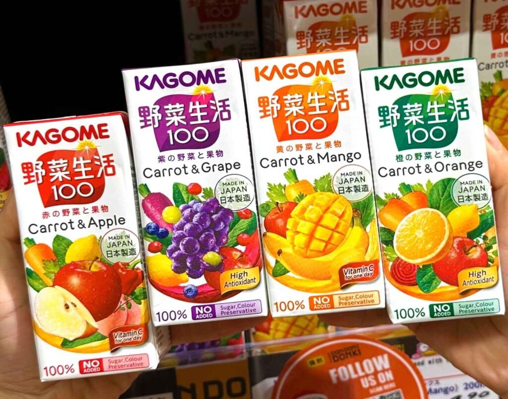 Kagome Yasai Seikatsu 100 vegetable and fruit juice featuring the Carrot & Apple, Carrot & Grape, Carrot & Mango, and Carrot & Orange varieties. This product line, originating from Japan, offers a blend of various fruits (40%) and vegetables (60%) in convenient 200ml packs, available at Jonetz By Don Don Donki Lot 10, a Japanese supermarket in Bukit Bintang, Kuala Lumpur.