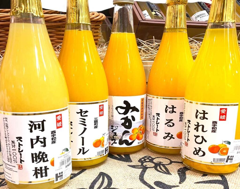 Premium 100% straight citrus juices from the Ehime Prefecture featuring Kawachi Balkan, Seminole Tangelo, Citrus Unshiu, Harumi Tangor, and Harehime Tangor on display at the Furu Furu section of Jonetz By Don Don Donki Lot 10, a Japanese supermarket in Bukit Bintang, Kuala Lumpur.