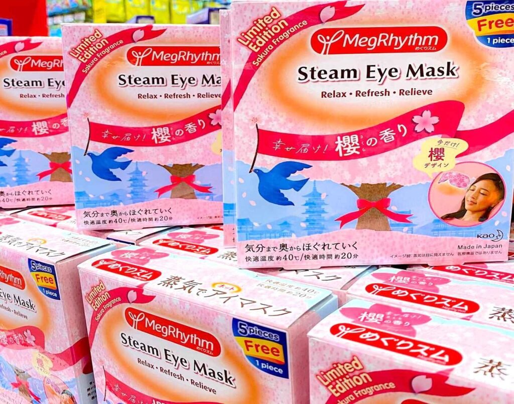 Limited edition MegRhythm steam eye masks in sakura fragrance, a popular Japanese wellness item found at CosmeDONKI, at Jonetz By Don Don Donki Lot 10, a Japanese supermarket in Bukit Bintang, Kuala Lumpur.