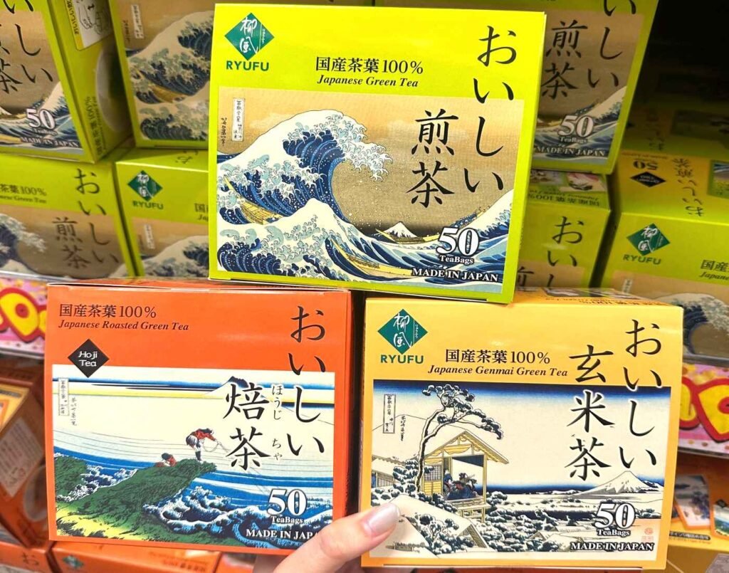 Three boxes of RYUFU Japanese tea bags (50 count each), featuring Sencha (green tea), Hojicha (roasted green tea), and Genmai Green Tea (brown rice tea) at Jonetz By Don Don Donki Lot 10, a Japanese supermarket in Bukit Bintang, Kuala Lumpur.