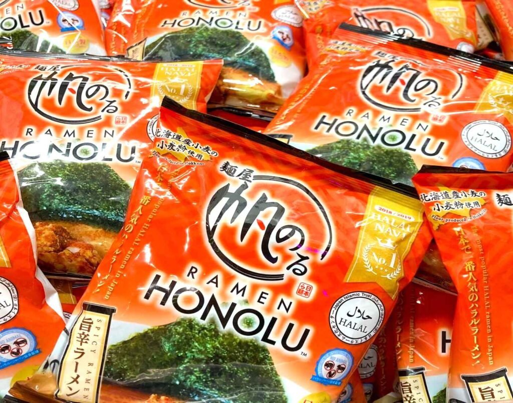 Packets of Ramen Honolu Spicy Ramen, a popular halal-certified Japanese instant ramen made with Hokkaido wheat flour, neatly displayed on store shelves at Don Don Donki Lot 10 in Bukit Bintang, Kuala Lumpur.
