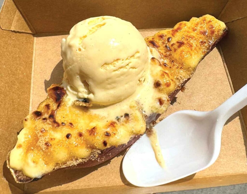 The Yakiimo Crème Brûlée dessert at the Sweet Potato Factory, featuring baked Japanese sweet potato topped with caramelized brown sugar and vanilla ice cream, served at Don Don Donki Lot 10 in Bukit Bintang.