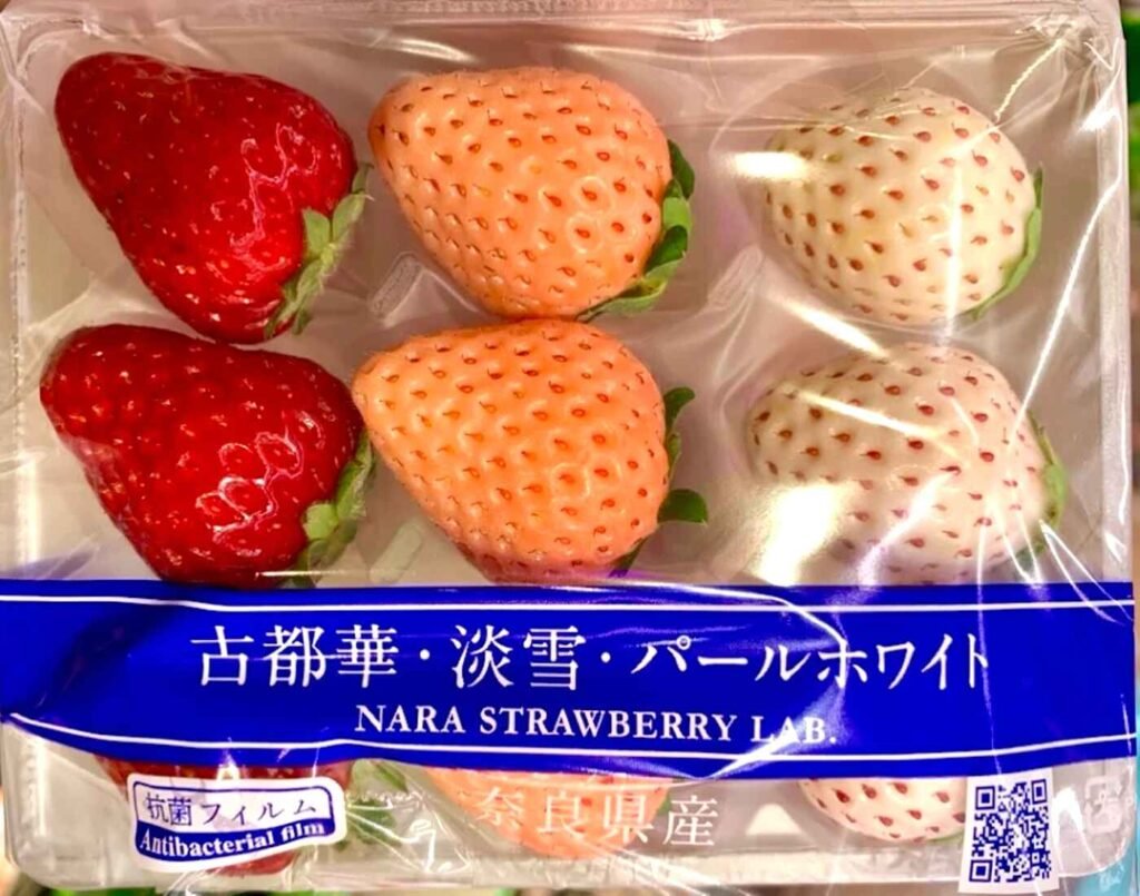 A luxury Japanese strawberry gift set from Nara Strawberry Lab at Don Don Donki Lot 10, featuring three premium varieties: Pearl White, Awayuki Sakura Pink, and Kotoka Deep Red, packaged with an antibacterial freshness film.